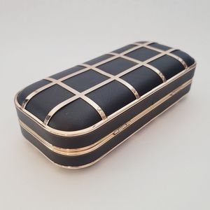 Beautiful Noir Luxe black and gold grid clutch